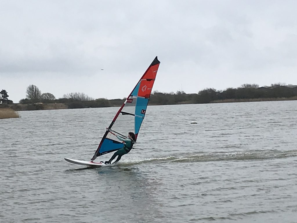 teenager blasting on lake at rye watersports