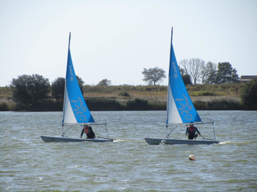 adults in single hander dinghies