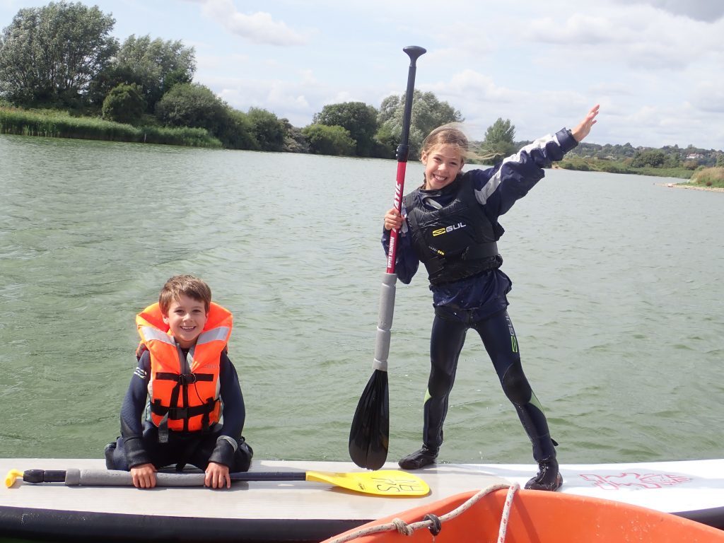 kids paddleboarding