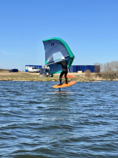 wingsurfer on flat water lake in the south east