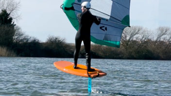 man on wingfoil kit at rye watersports