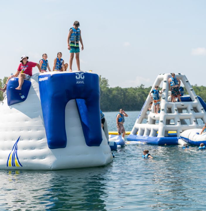 teenagers preparing to jump off the anvil at rye waterpsots aquapark